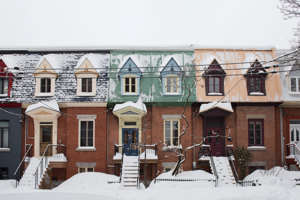A row of houses on an urban street.