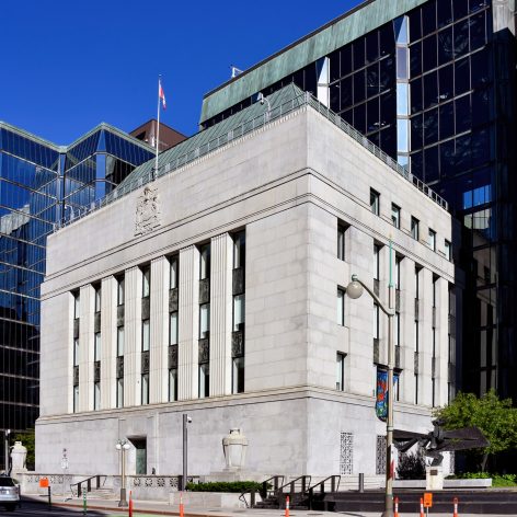 Ottawa, Canada - June 15, 2024: The Bank of Canada Building on Wellington Street. The Bank of Canada is a Crown Corporation and Canadas central bank and is responsible for formulating Canada's monetary policy and setting the interest rate on borrowed money.